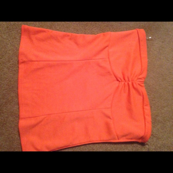 Strapless bright orange top