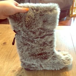 Fuzzy gray boots.