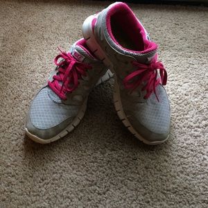 Grey and pink nike free