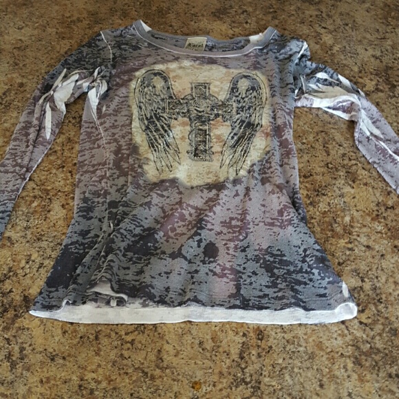 long sleeve shirt with a beautiful  cross w/bling