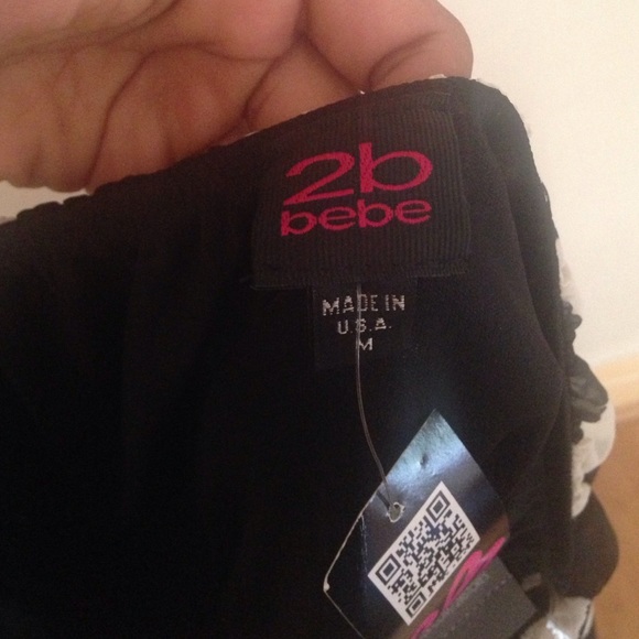 A Bebe strapless dress, you can dress up or down