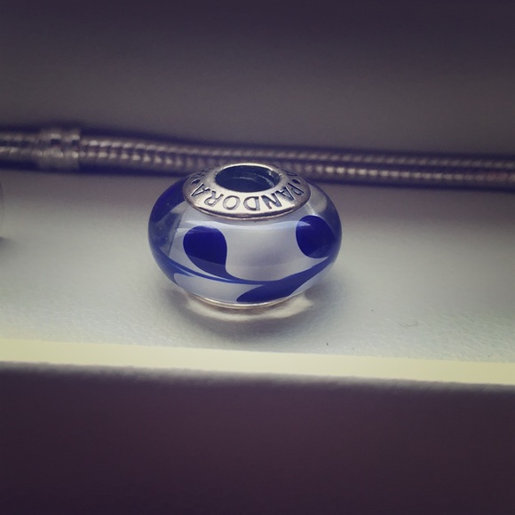 Blue and white Pandora charm.