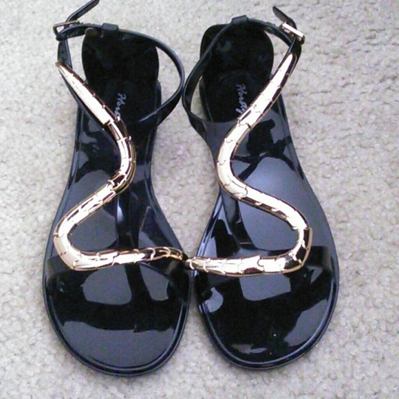 Black jelly sandals with snake serpent design