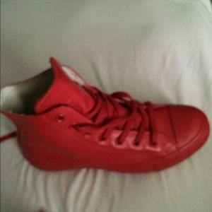 Red  leather hi-top converse