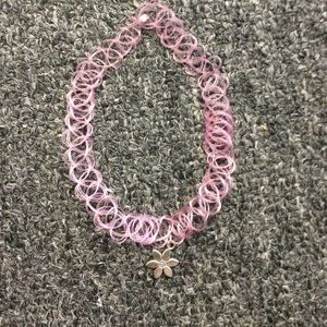 Pink choker with flower charm