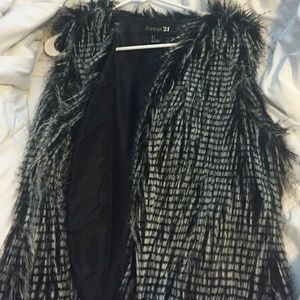 gray and black faux fur vest