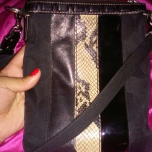 Black Coach Crossbody purse.