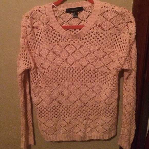Pink colored sweater
