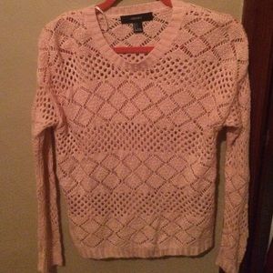 Pink colored sweater