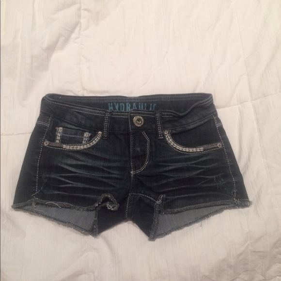 Dark washed hydraulic shorts.