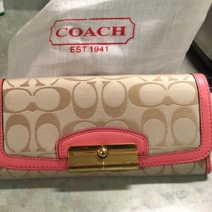 Coach wallet with pink leather accents