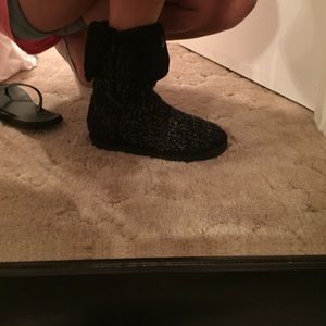 Black and cream/white boots