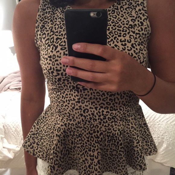 NWOT Cheetah Peplum Top