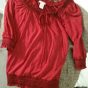 Peasant blouse-eye hook. neckline with  tassels.