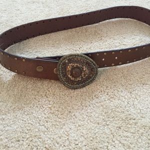 Intricately decorated brown belt