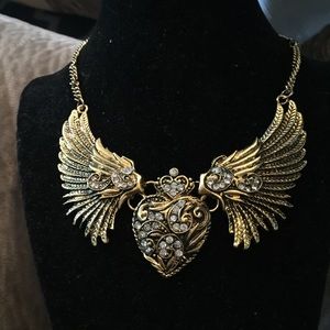 Very pretty angel wing necklace