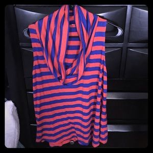 Large, orange and blue cowl neck shirt.