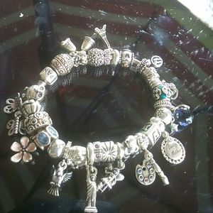Pandora bracelet full of beads. Not for sale.