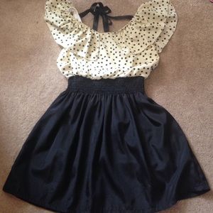 A cute dress with clinched waist and open back