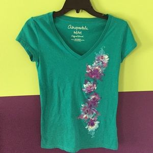 Teal v neck with purple flowers