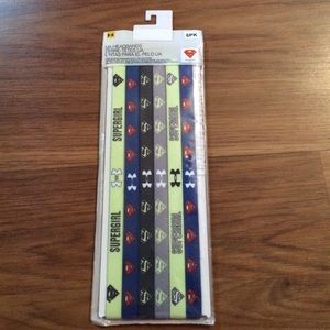 Superman and Supergirl Under Armour headbands.