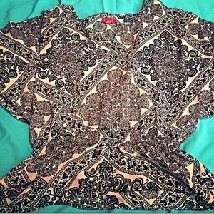 Black and white patterned shirt.