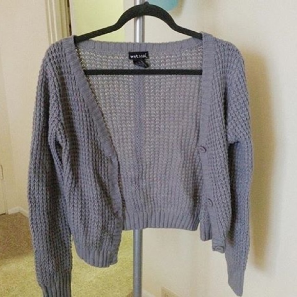 Grey knit cardigan.