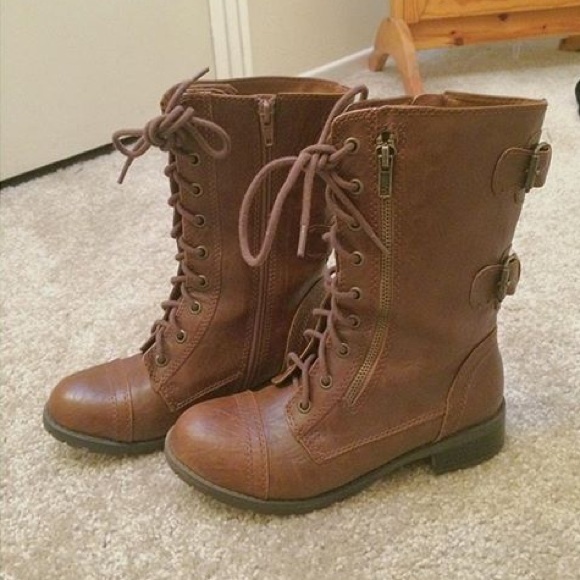 Brown combat booties.