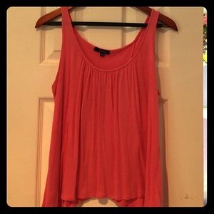 Pink sleeveless party top.