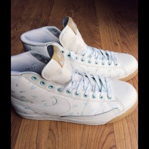 Nike blazers with little baby blue birds on them.