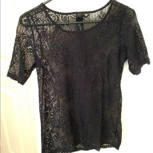 Long black lace top with the zipper in the back.