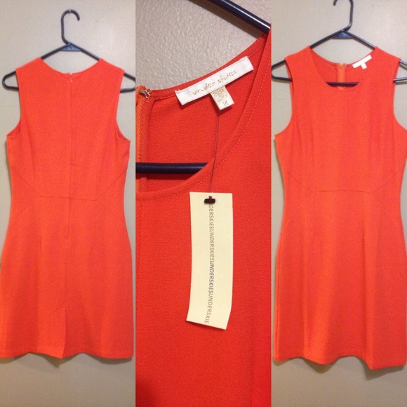 Coral knee-length dress.