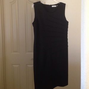 Sleeveless black sheath dress