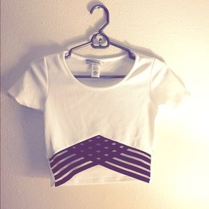 White crop top with black cross cross middle