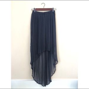 Black pleated high-low skirt