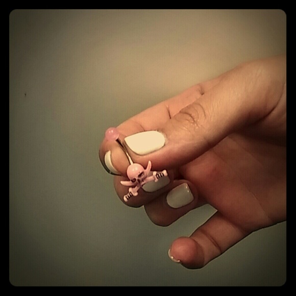 Pink skeleton belly ring