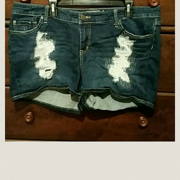 Dark was distressed jeans