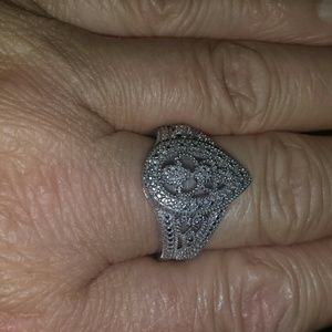 Sterling silver diamond filigree ring.