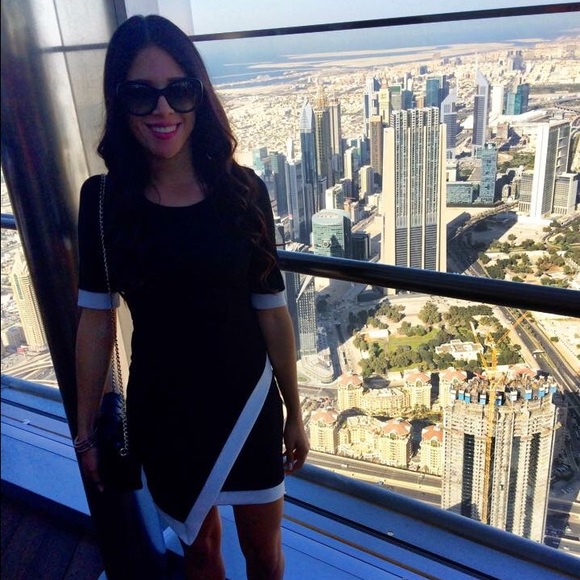 Gorgeous black dress with white detail!