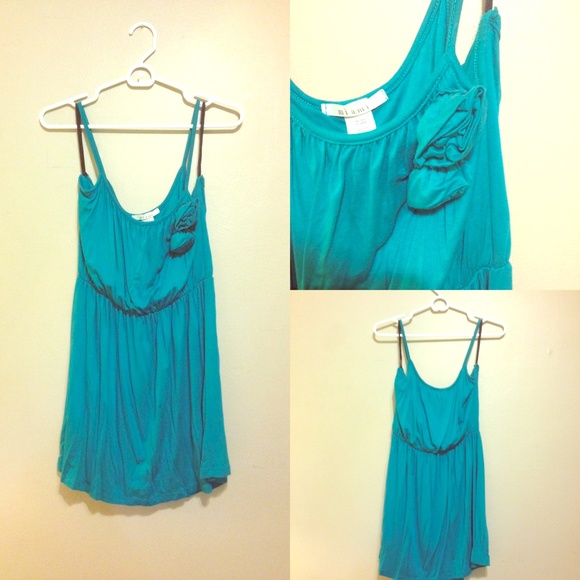 Teal blue summer dress with flower appliqué