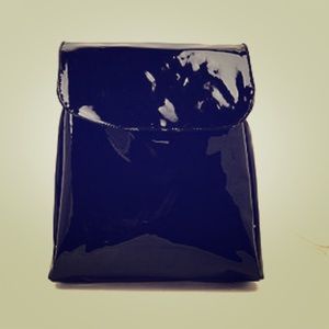 American Apparel poly vinyl mini backpack.