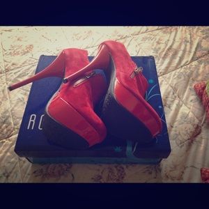 Red ankle boot.. Great with a blue jean look!!