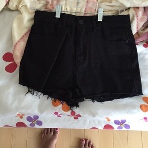 High waisted black studded shorts