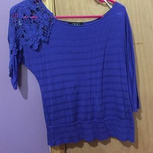 A cute top with sleeves about mid arm length