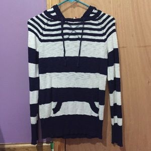 A striped long sleeve hooded sweater