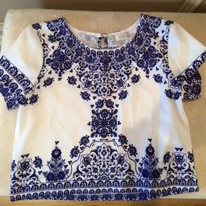 White crop top with purple designs