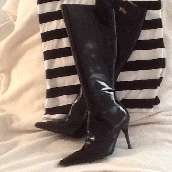 Black Baby Phat patent leather boots.