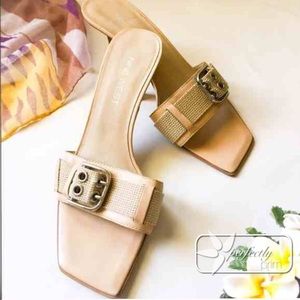 Kitten heel cream slip on summer shoe