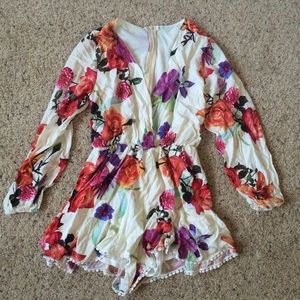 Floral Long sleeve Romper comfortable & never worn