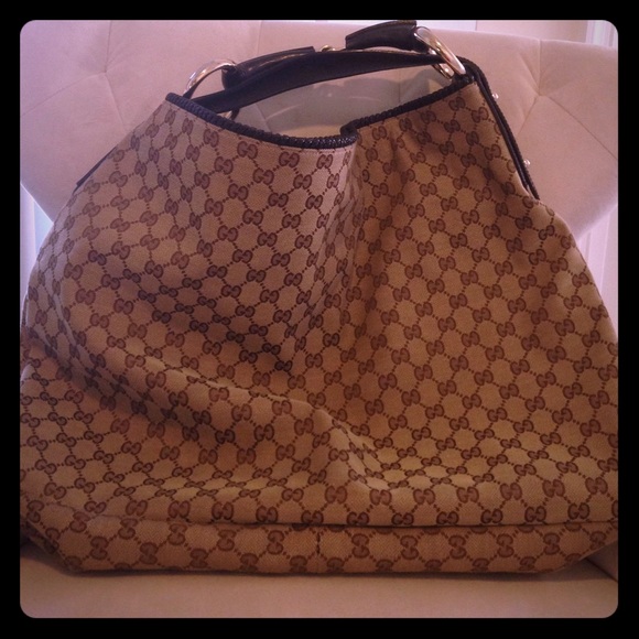 Gucci Handbags - Authentic large Gucci bag in dark brown with gold